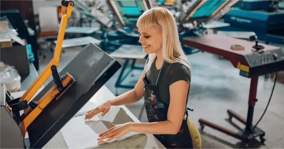 Business Owner Operating Screen Printer